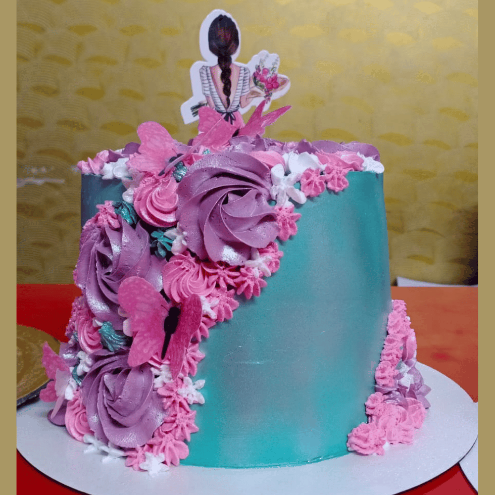 Pineapple cake with girl topper.