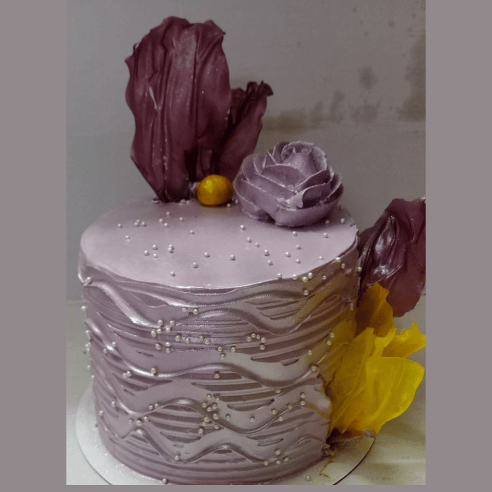 Tall cake with rice paper garnishing​